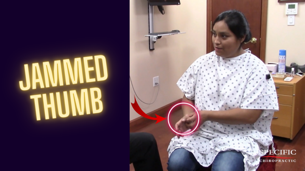Female patient unable to extend her jammed thumb back due to a freak injury, showing visible limitation before chiropractic adjustment